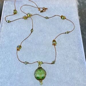 Brown thread Necklace w/ Green Glass Pendant and gold tone accents